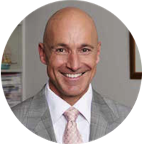 Reader smiling after reading A New Approach to Headache and Migraine by Pablo.