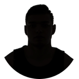 Person reading a book in a calm setting, symbolising the reflective and positive reviews of Pablo Tmoszuk’s headache and migraine book.