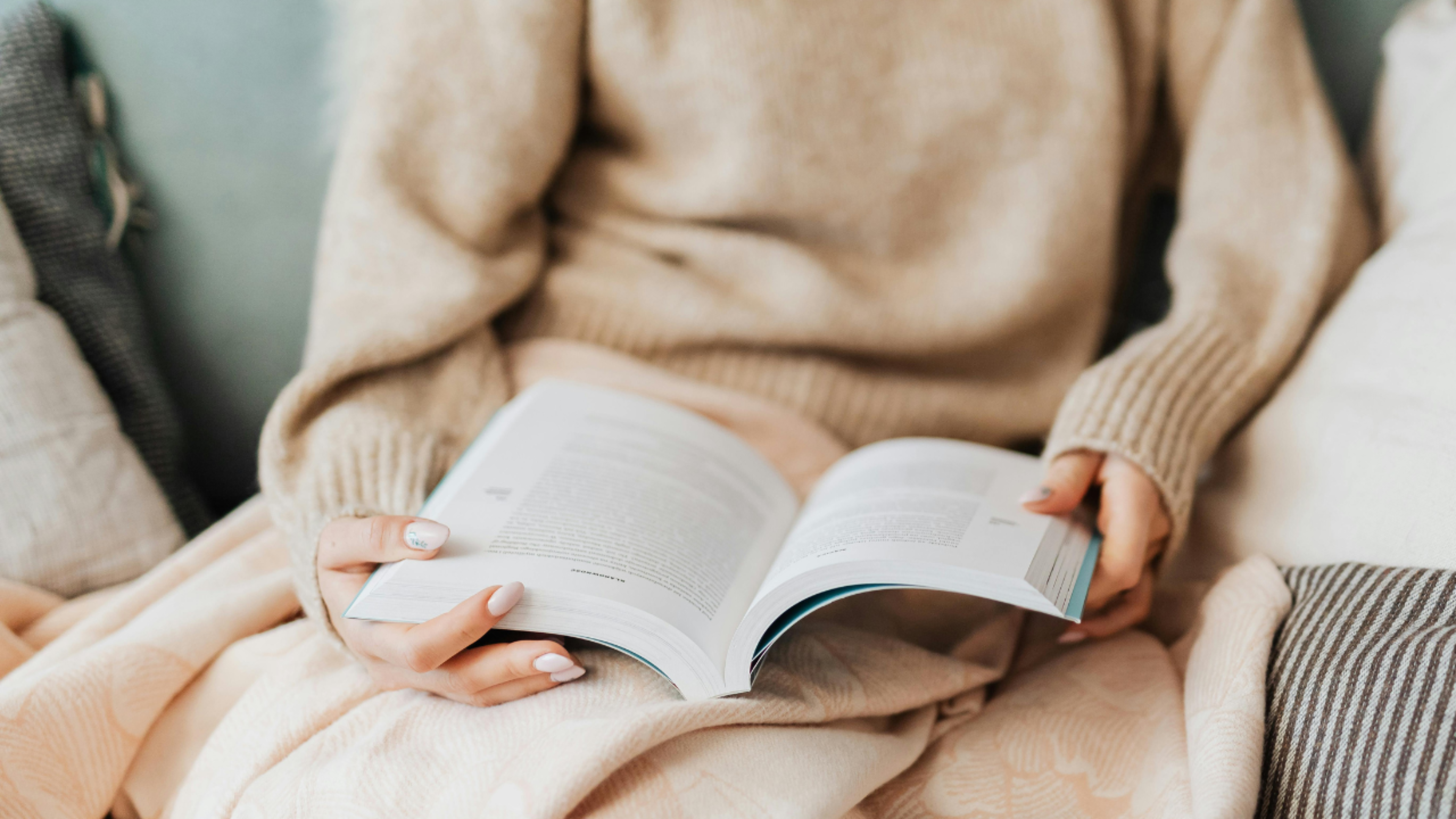 The book, A New Approach to Headache and Migraine being read in a calm space, reflecting the insights and reviews shared by readers and practitioners.