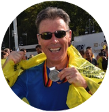 Satisfied and happy client sharing a positive review after massage treatment with Pablo.