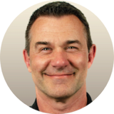 Satisfied and happy client sharing a positive review after massage treatment with Pablo.